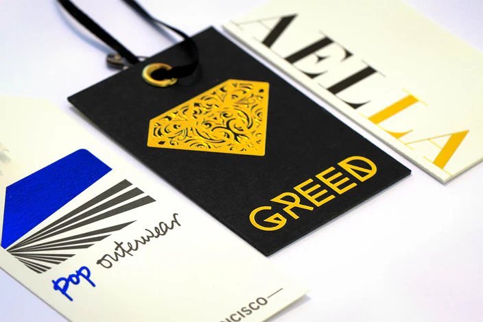 Assorted custom hang tags for apparel and retail brands